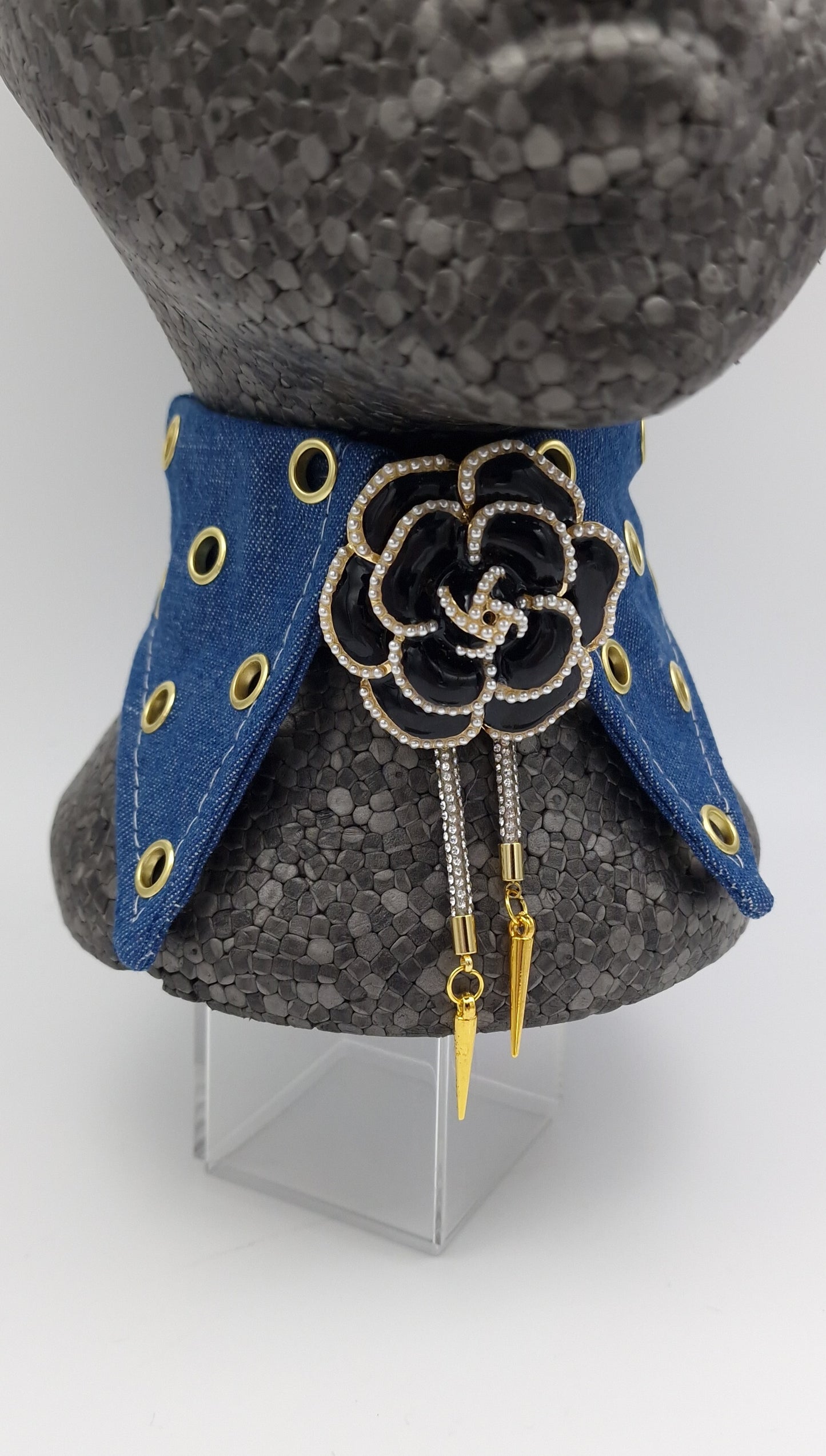 The eyelet denim collar and bolo tie